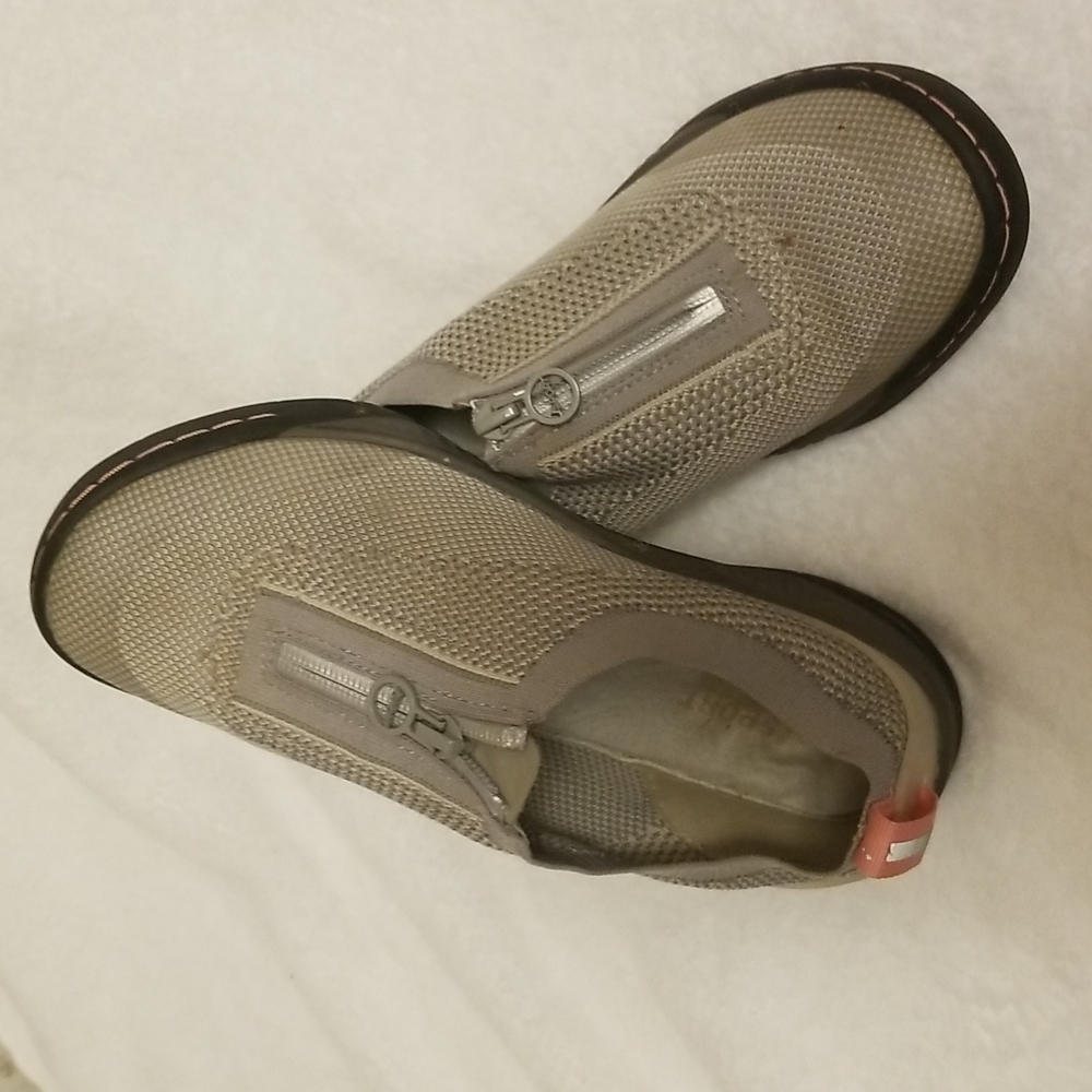 Shoes sport brand gray in color